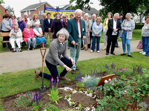 Theresa May MP unveiling a flower bed in Woodford Park, created by the Friends of Woodford Park