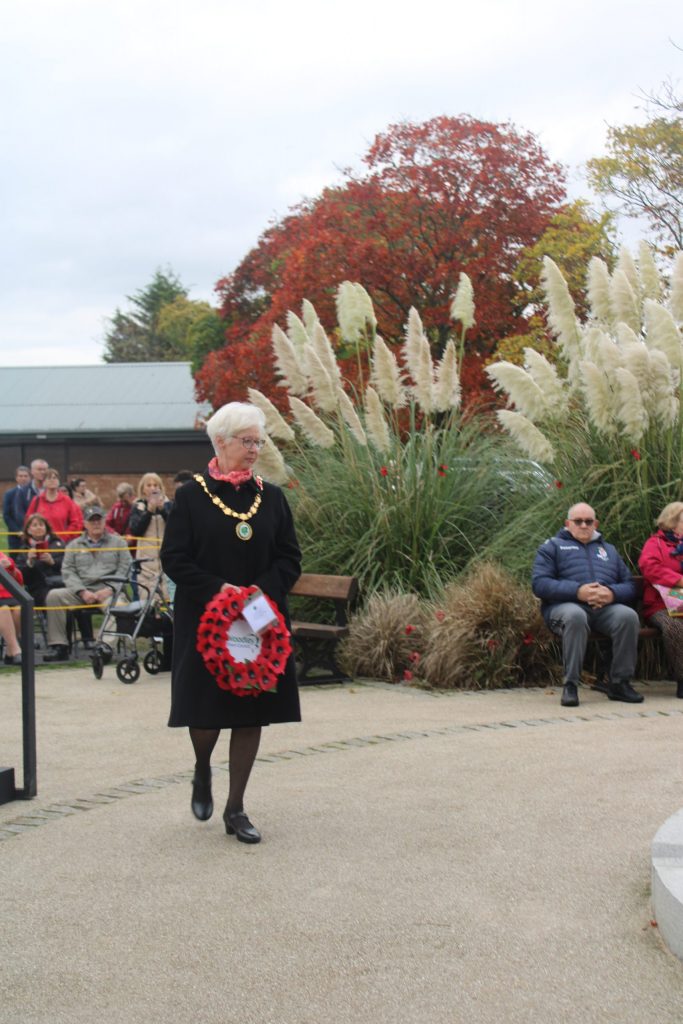 Councillor Janet Sartorel, Woodley Town Mayor, laying wreath at Woodley War Memorial